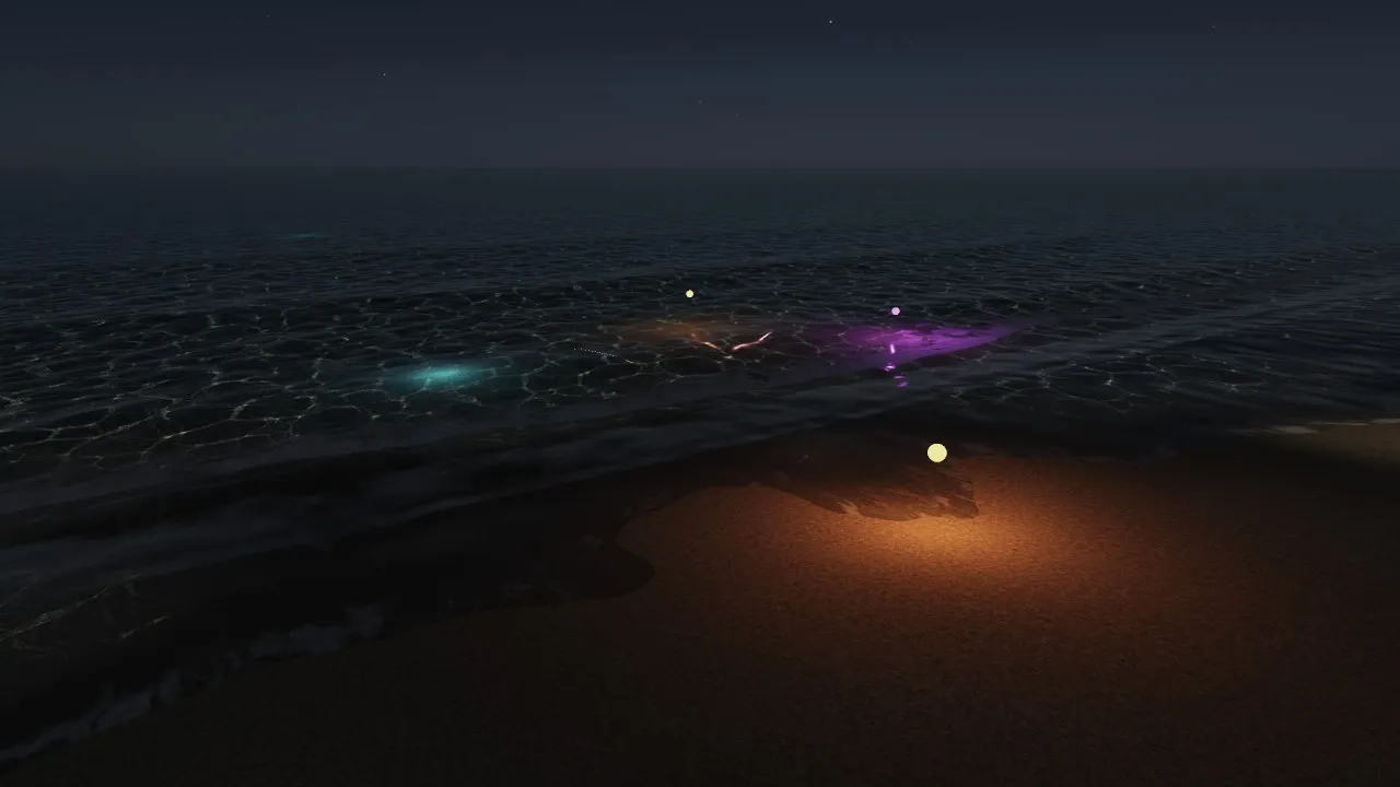 夜の浜。砂の上のランプが砂を、浅瀬の上のランプが水の中の底と水面を照らし、水の中の青いランプと色の変わるランプが光っている
