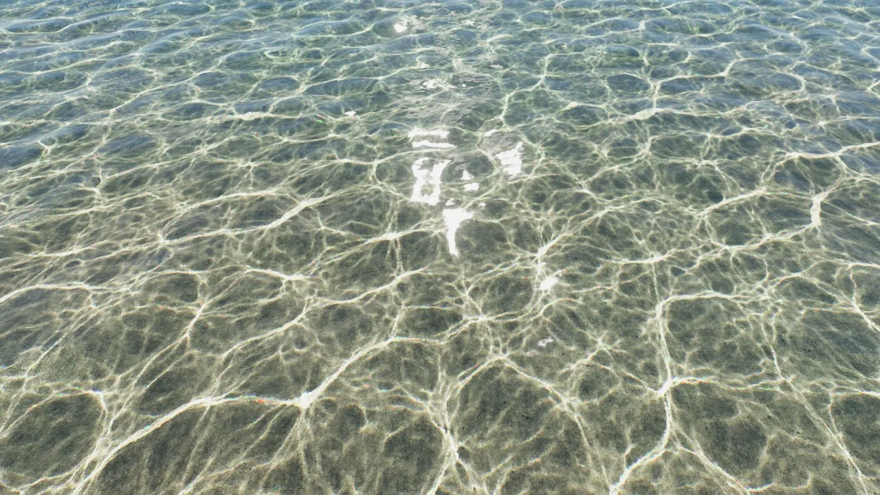 浅瀬を上から見た水面と水底の光の模様